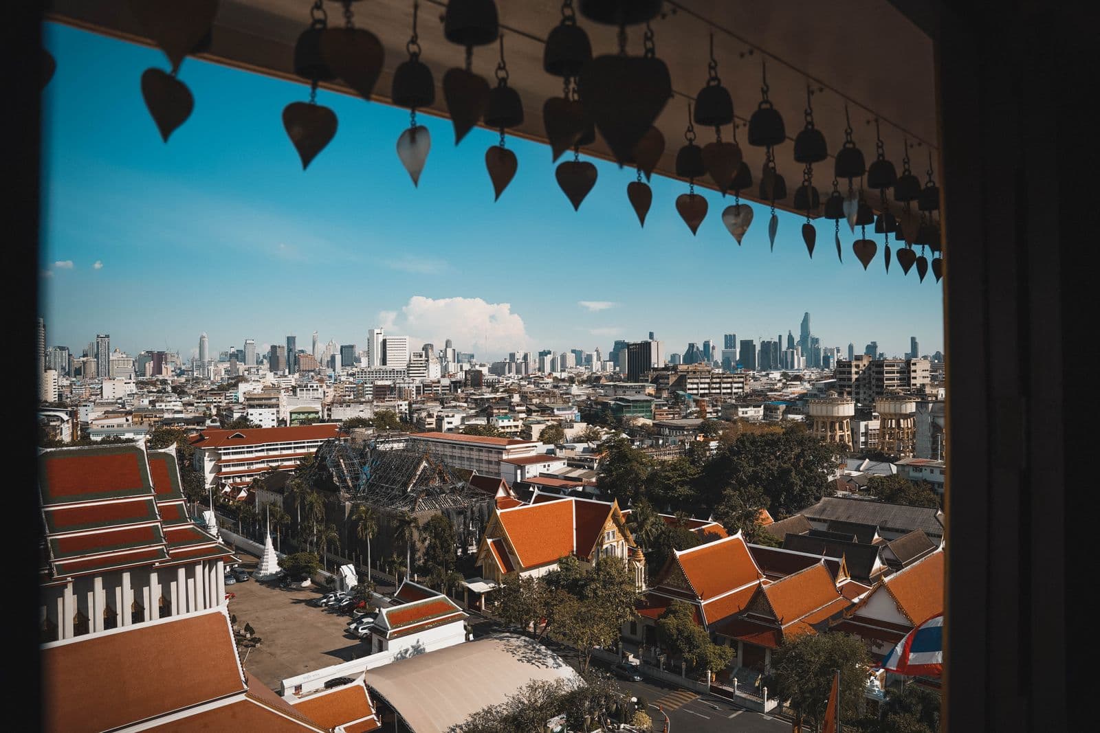 Temple roofs against the Bangkok skyline